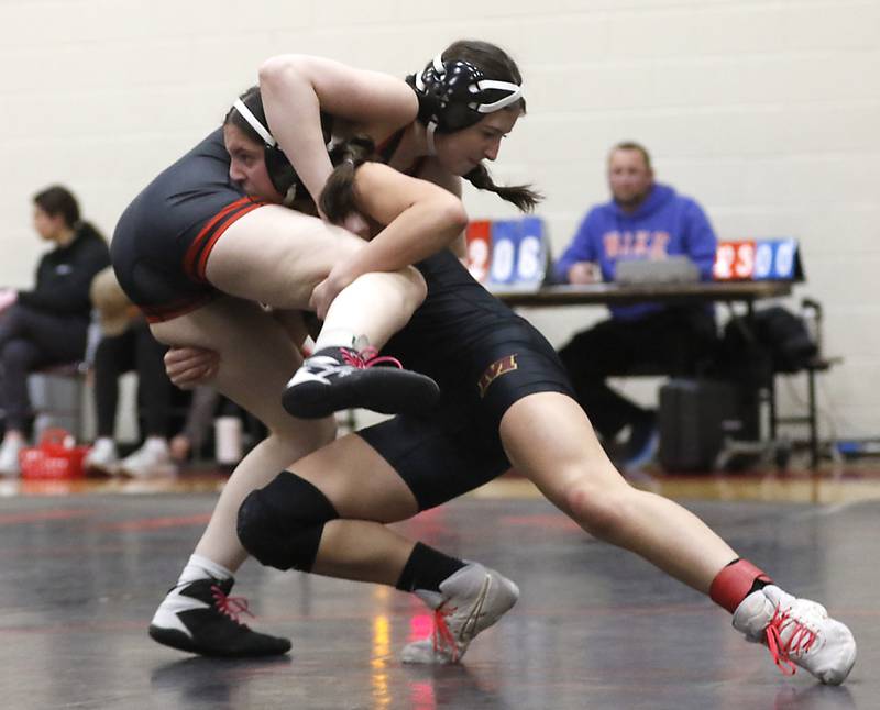 Morris’ Zara Lugo takes down Huntley’s Albina Ramadani in the 125-pound match of a nononference wrestling meet on Wednesday, Jan. 22, 2025, at Huntley High School.