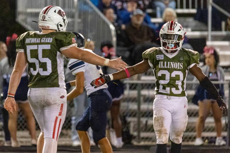 Cole Winterrowd (left) & Jordan Lukes (right) of Streator high five on Friday, October 4, 2024 at Streator high school in Streator.