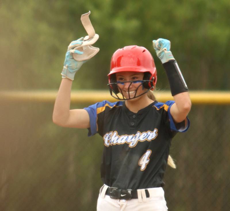 Aurora Central Catholic’s Grace Grunloh celebrates arriving safely at second base against Marengo in varsity girls softball IHSA Class 2A Regional Title Game action on Friday, May 22, 2026 at Raymond Benoy Field on the campus of Marian Central High School in Woodstock.