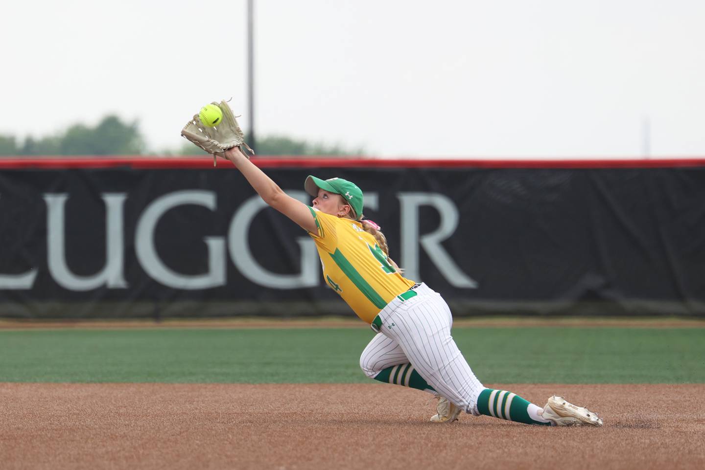 Providence Catholic's Ava Misch makes a diving catch for an out during the Celtic's 5-2 win over St. Laurence in the IHSA Class 3A state semifinal on Friday, June 13, 2025.