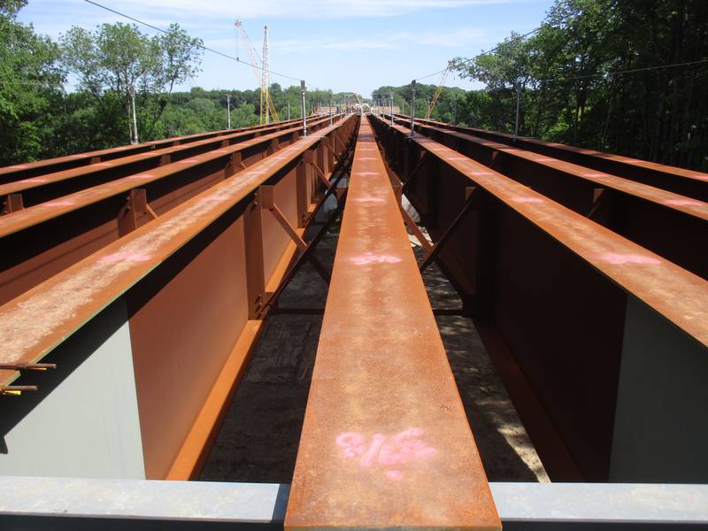 These steel I-beams will support the roadway deck for the Eldamain Road bridge, seen here looking north from the south bank of the Fox River. (Mark Foster -- mfoster@shawmedia.com)