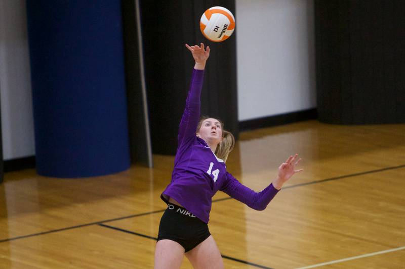 Hampshire's Emily Mohr with the serve against McHenry on Tuesday, Sept. 6,2022 in McHenry.