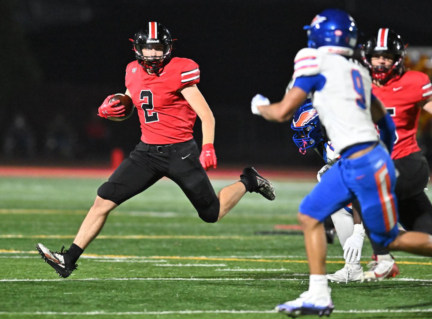 Lincoln Way Central's Robert Tingley (2) runs the ball during the Class 7A second round playoff game  against Hoffman Estates on Friday, Nov 08, 2024 at New Lenox. (Dean Reid for Shaw Local News)