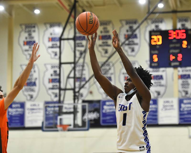 Lincoln-Way East's Tylon Tolliver (1) shoots a jump shot against Plainfield East on Saturday, Jan. 8, 2022, at Frankfort.