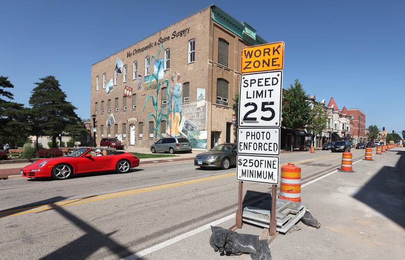 Traffic follows the new lane configuration Tuesday June, 14, 2022, on Lincoln Highway near the intersection with First Street in DeKalb. Construction is underway on Lincoln Highway between First and Fourth Streets.