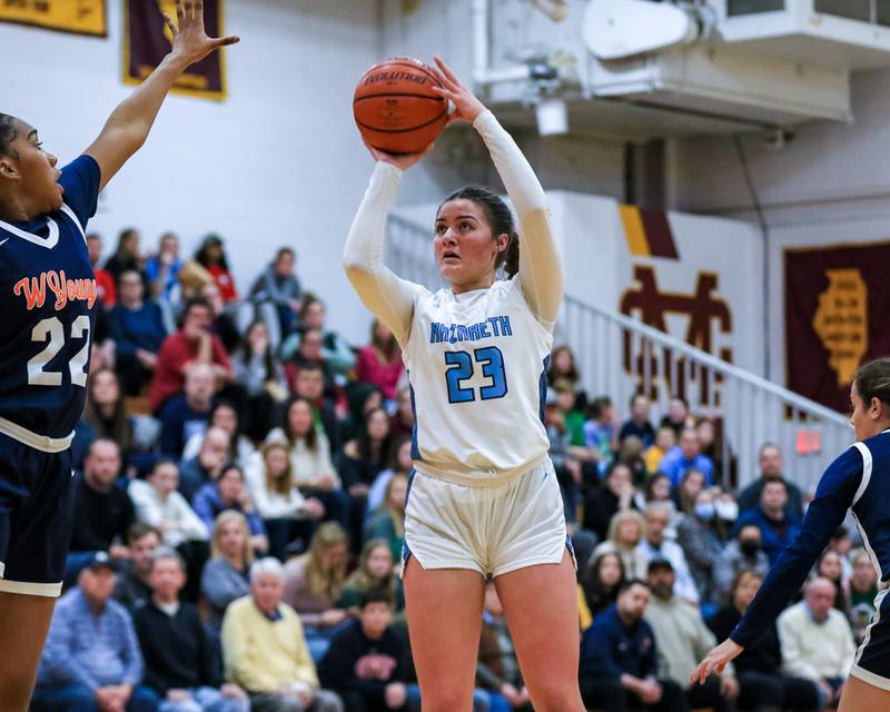 Nazareth's Danni Scully (23) shoots a jump shot during the Montini Christmas Classic, championship basketball game between Nazareth vs Young.  Dec 30, 2022.
