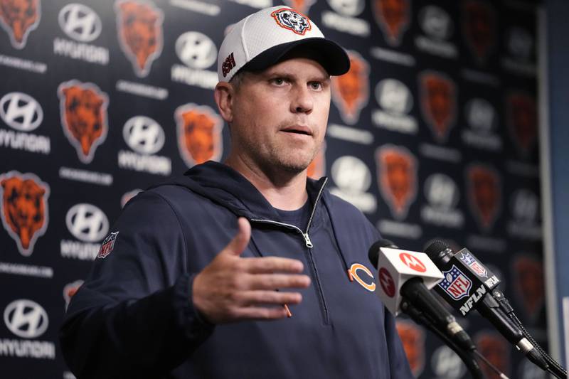 Chicago Bears offensive coordinator Shane Waldron speaks during a news conference after NFL football practice in June 2024 in Lake Forest, Ill..