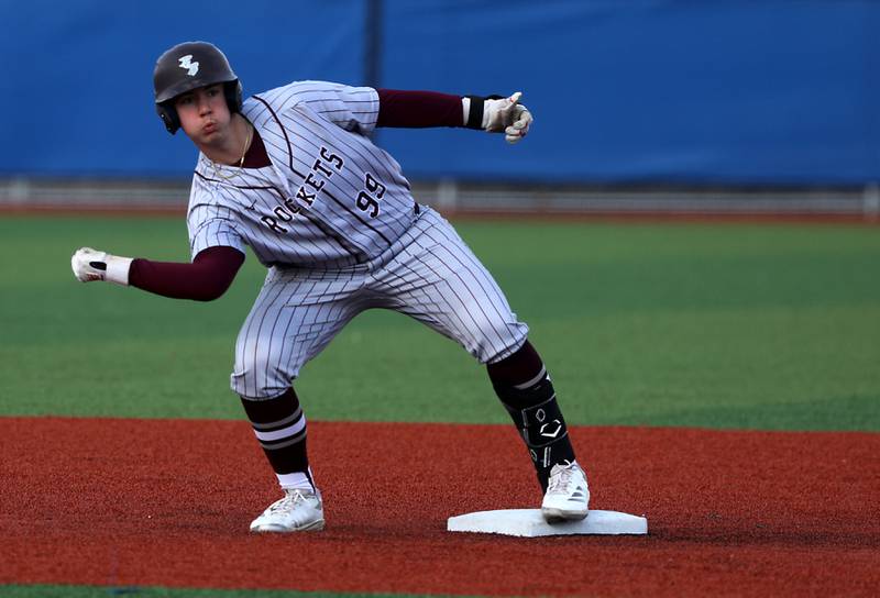 Richmond-Burton's Anthony Harvey celebrates a double during a Kishwaukee River Conference baseball game against Johnsburg on Monday, April 6,2026, at Johnsburg High School.