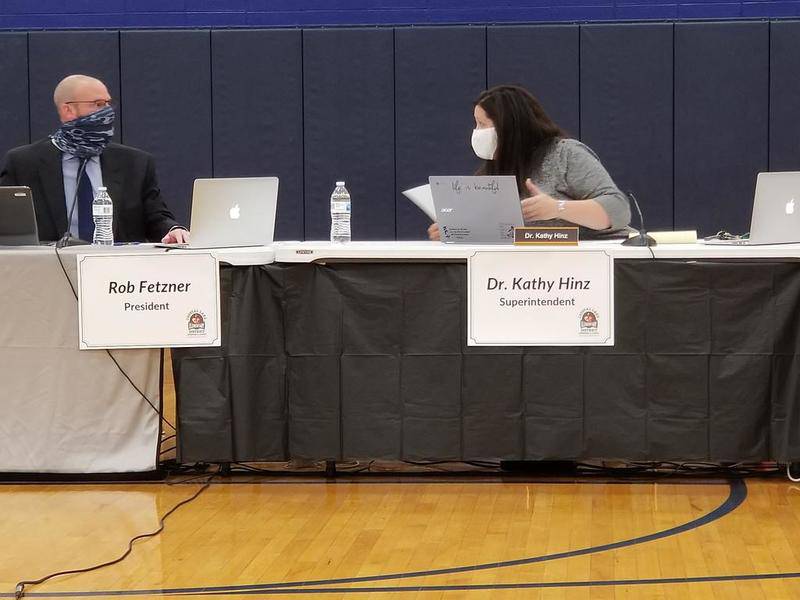 Crystal Lake Elementary School District 47 Superintendent Kathy Hinz speaks with school board president Rob Fetzner at Hannah Beardsley Middle School during a meeting Monday night.