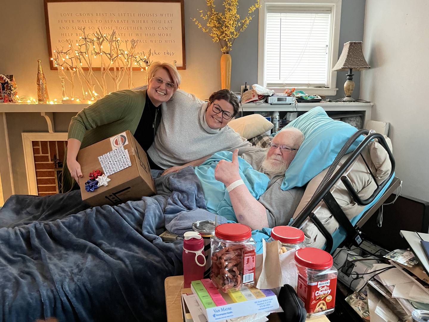 Senior Vice-Commander Becky Davis and Adjutant Marddi Rahn deliver a Battle Buddy Box to Pat McPherson in his Polo home.