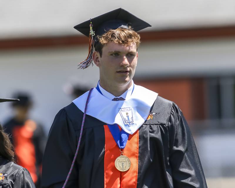 Valedictorian Keegan Herren marches onto the field during the Sandwich High School Graduation ceremony Sunday, May 18, 2025  in Sandwich.