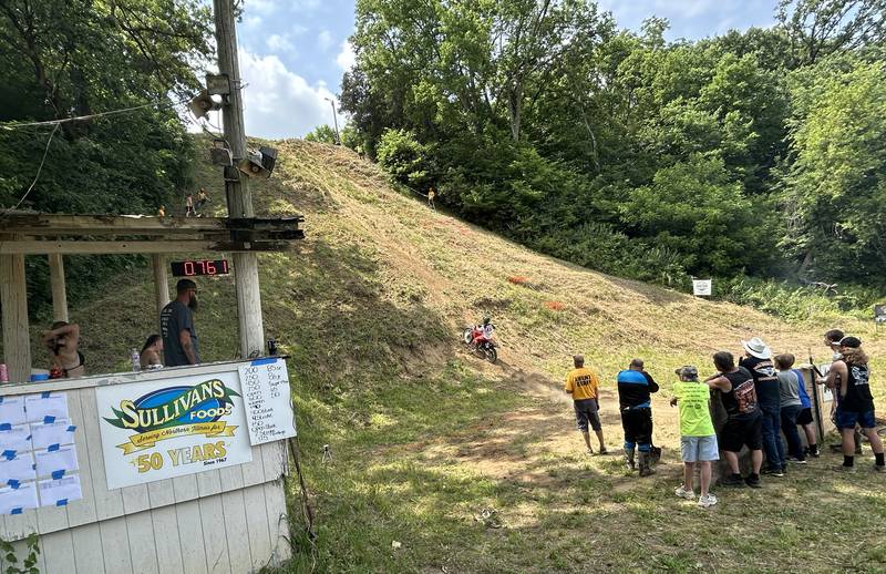 A rider makes a run at the hill during the Rock River Riders Motorcycle Club's Father's Day Hillclimb on Sunday, June 15, 2025.