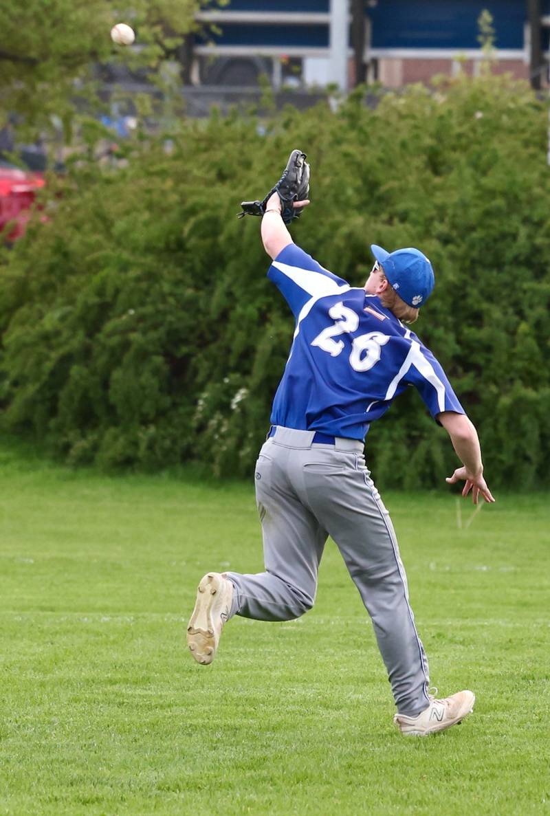 Princeton left fielder Jace Stuckey tracks down a fly Monday at. Prather Field. Hall won 10-4.