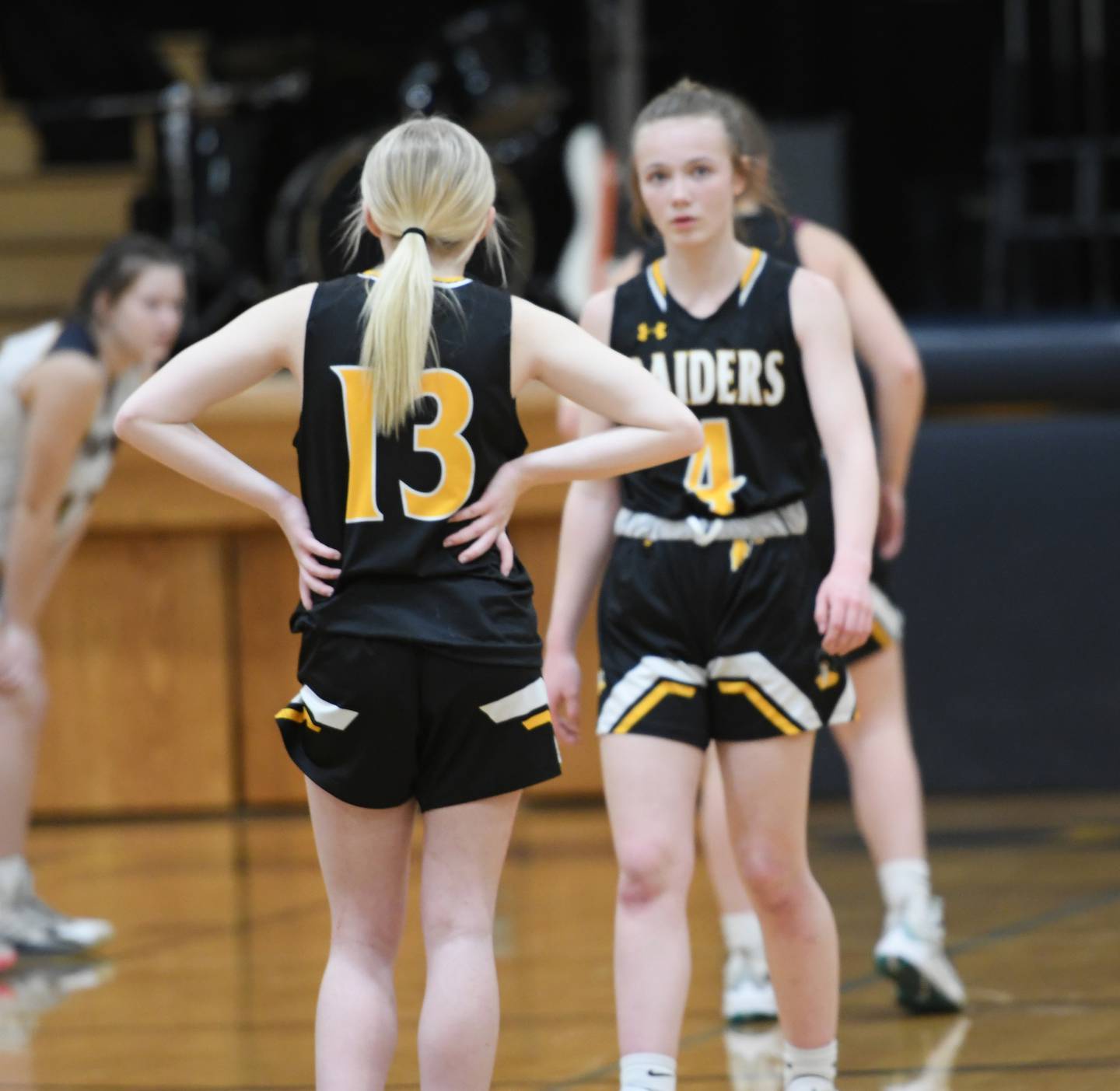 AFC's Reese Polk (4) walks towards Cameryn Winterland (13) in the final seconds of their game with Polo on Friday, Feb. 3.