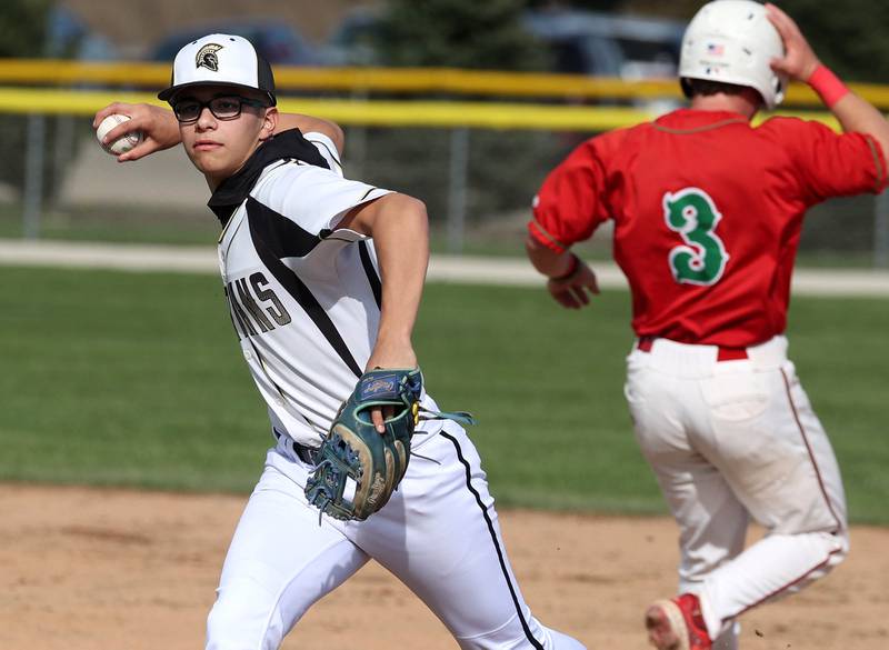 Sycamore's Sawyer Valdez takes the out at first Wednesday, April 23, 2025, during their game against La Salle-Peru at the Sycamore Community Sports Complex.