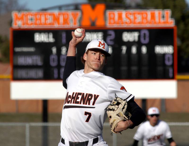 McHenry’s Brandon Shannon delivers against Huntley in varsity baseball at McHenry Friday night.