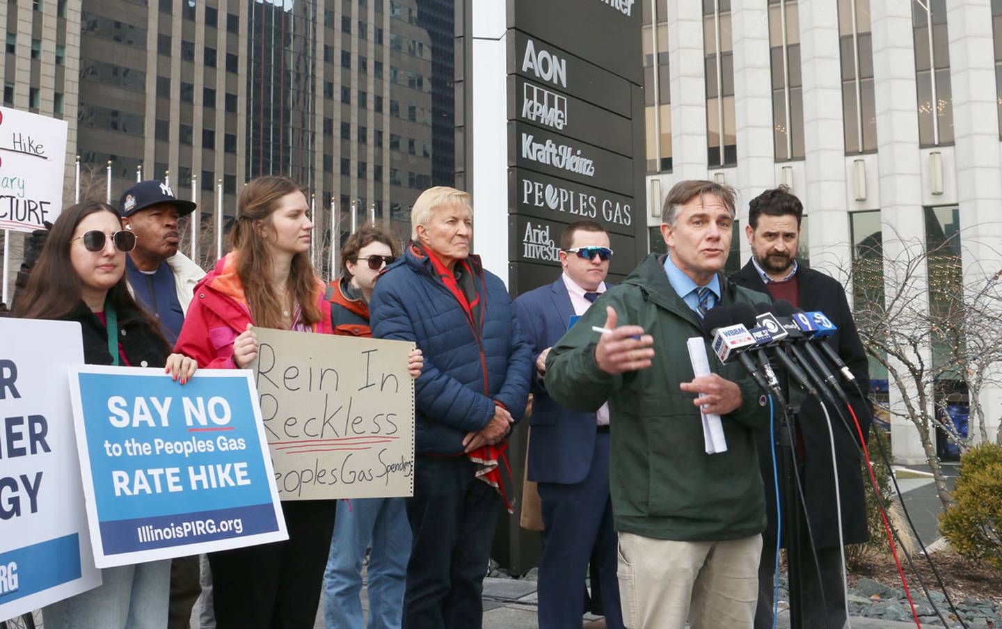 Citizens Utility Board Communications Director Jim Chilsen speaks to reporters on Jan. 6, 2026, at a demonstration protesting Peoples Gas’ rate hike request to the Illinois Commerce Commission.