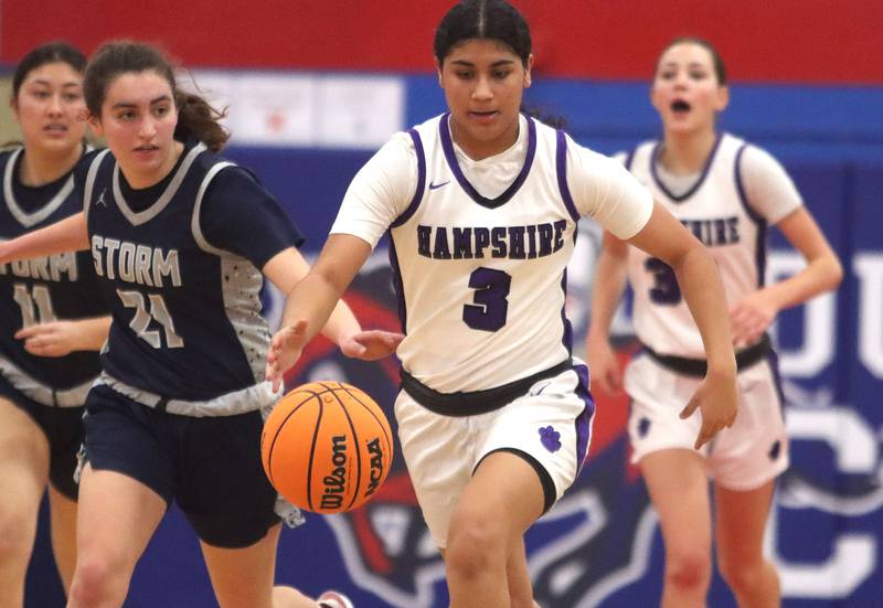 Hampshire’s Jiselle Lopez leads a fast break against South Elgin in varsity girls basketball Komaromy Classic tournament  action on Monday, Dec. 29, 2025, at Dundee-Crown High School in Carpentersville.