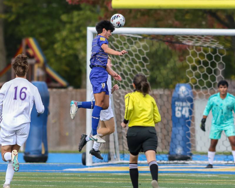 Lyons Austen Wisniewski (5) heads the ball during Class 3A Lyons Regional final soccer match.  Oct 21, 2023.