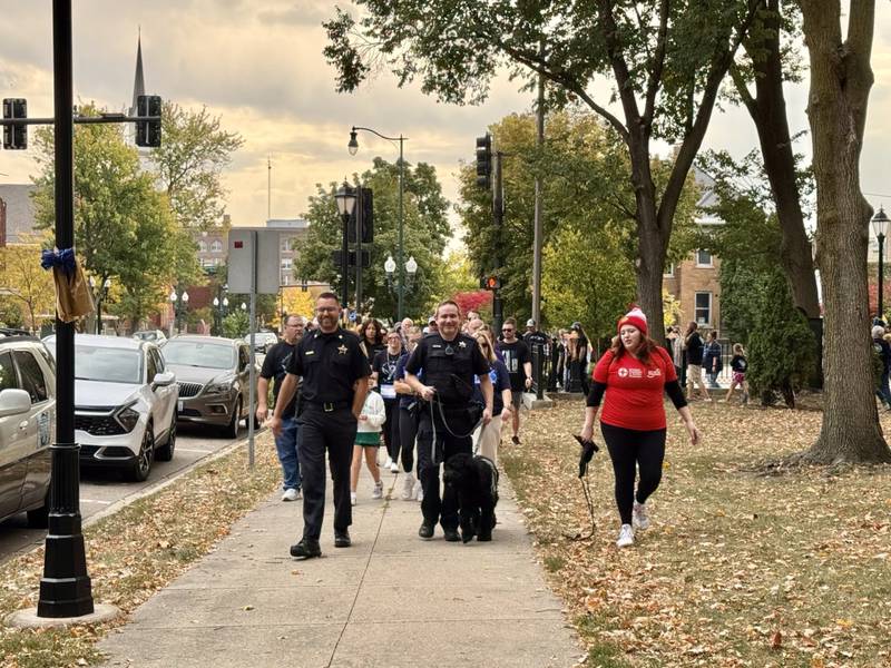 Rookie and Ottawa officers lead annual Out of the Darkness Walk, which included a morning run, a mental health resource fair, family activities and a memorial walk.
