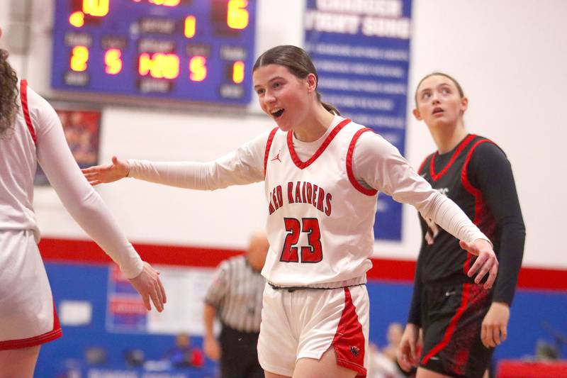 Huntley’s Aubrina Adamik greets teammate Luca Garlin after Garlin attracted a foul on a layup against Mundelein in varsity girls basketball Komaromy Classic tournament  action on Tuesday, Dec. 30, 2025, at Dundee-Crown High School in Carpentersville.