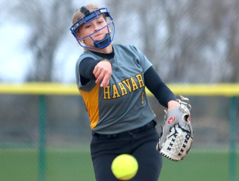 Harvard’s Tallulah Eichholz delivers in varsity softball at Marengo Thursday.