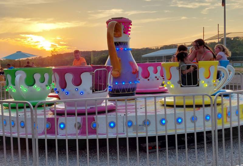 Children enjoy the teacup ride Saturday, Sept. 24, 2023, at the Shipyard Days carnival in Seneca.