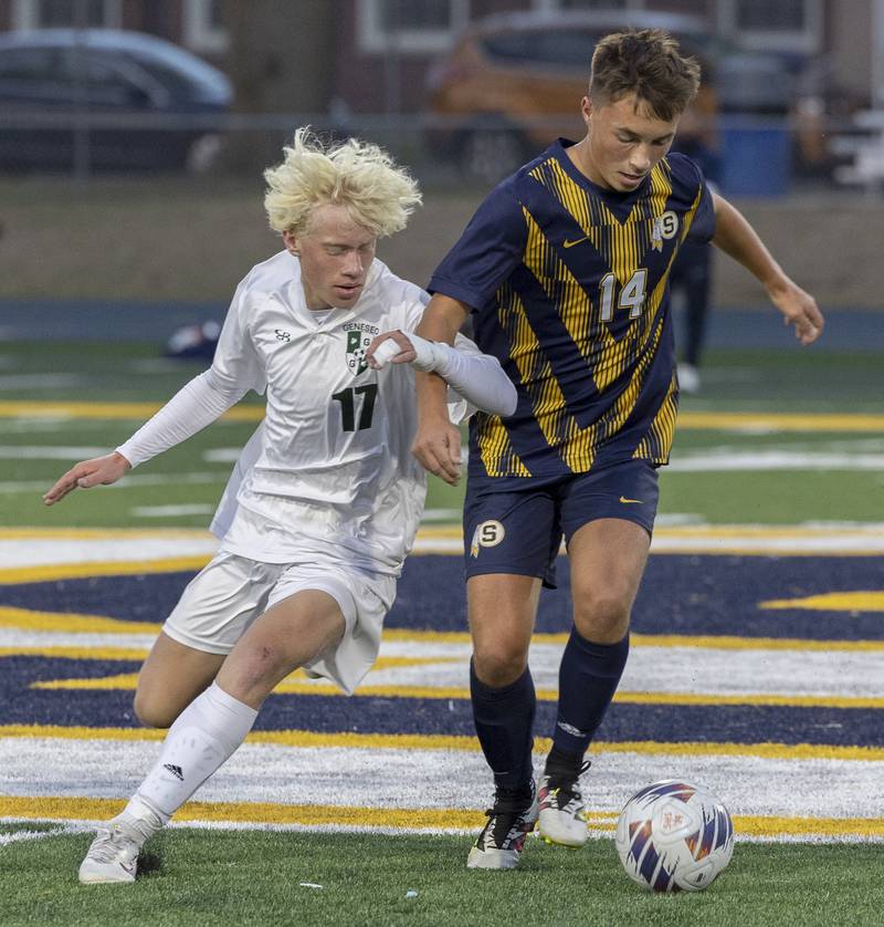 Sterling’s Ian Hilty fights for the ball against Geneseo’s Cole Clifton Tuesday, October. 1, 2024, at Sterling High School.