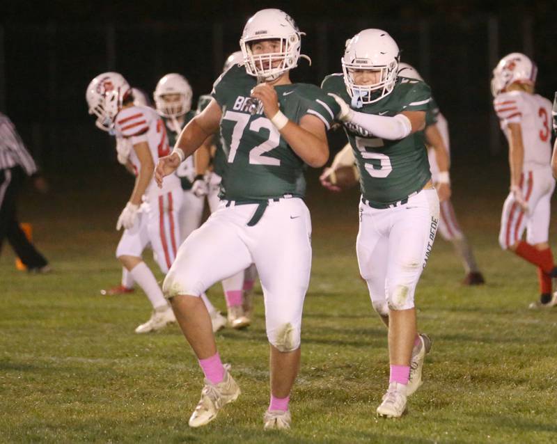 St. Bede's Mason Moreno dances off the field with teammate Halden Hueneburg after the team scored a touchdown against Ottawa on Friday, Oct. 25, 2024 at St. Bede Academy.