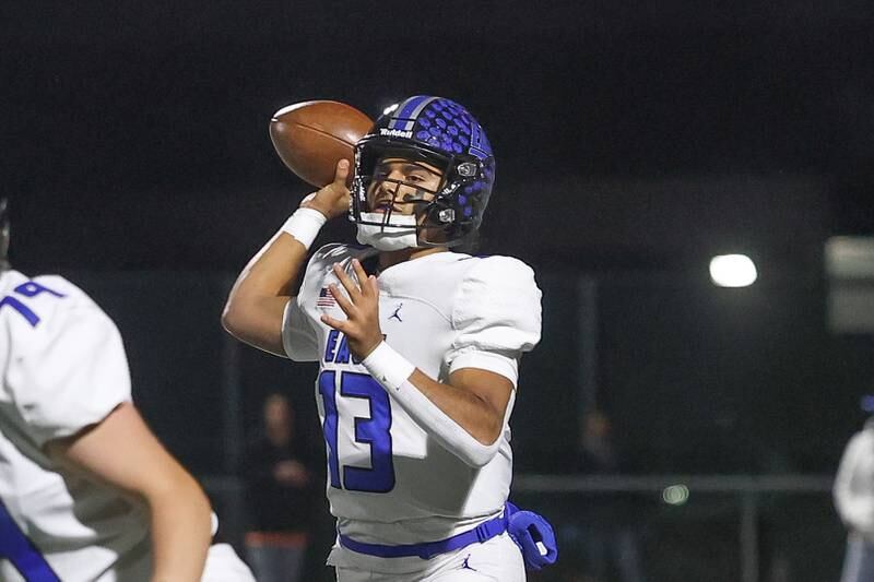 Lincoln-Way East’s Jonas Williams passes against Minooka on Friday, Nov. 8, 2024 in Minooka.