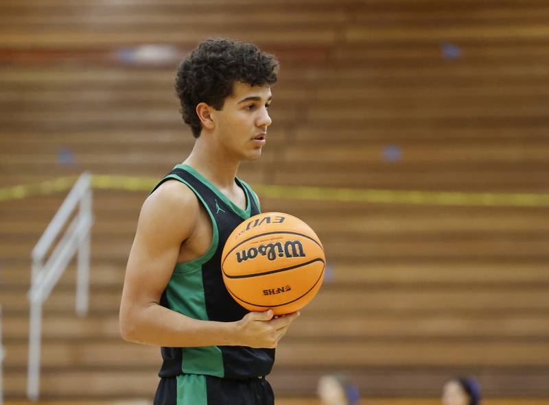York's Sawyer Asgedom (3) looks to the bench during a stoppage at the varsity basketball game between York Community and Lyons Township high schools on Friday, Jan. 9, 2026 in La Grange.