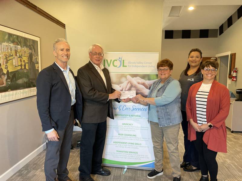 The Starved Rock Country Community Foundation recently made a $1,500 grant to the Illinois Valley Center for Independent Living for construction of residential ramps for its customers. (From left) SRCCF President Fran Brolley, SRCCF Board Chair Reed Wilson and IVCIL’s Executive Director Sarah Stasik, Resource Director Jessica Ortega and Associate Director Marie Argubright.