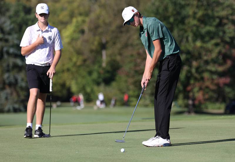 LaSalle-Peru’s Michael Milota putts on the third green Monday, Sept. 23, 2024, during the Interstate 8 boys golf tournament at the Kishwaukee Country Club in DeKalb.