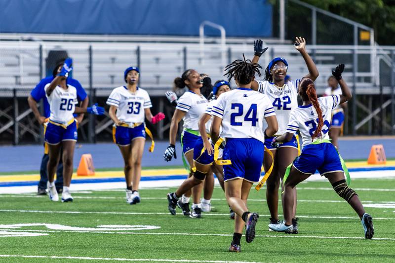 Bloom celebrates after scoring a touchdown during a varsity flag football game at Joliet Central on Sept. 11, 2025.