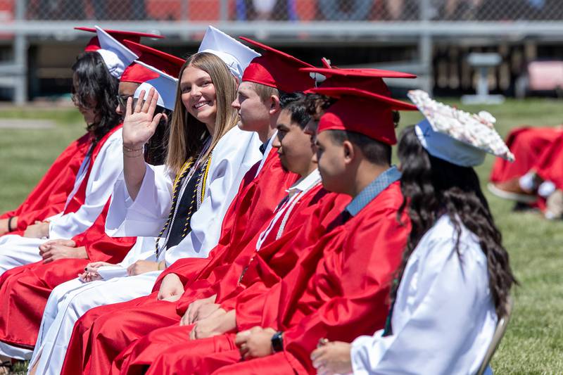 Mady Ponsetti waves to crowd on Sunday, May 18, 2025 at Hall High School in Spring Valley.