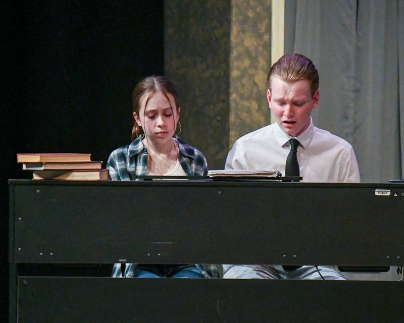 Thomas Kings, right, and Delilah Pawlowski try to write a song during a one act play called Bittersweet Lullaby on Saturday March 22, 2025, held at Lyons Township High School south campus.