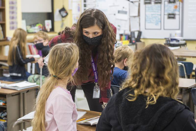 Madison fifth-grade teacher Shannon Sherlock speaks with a student during a lesson, shown in a file photo from Oct. 28, 2021. Sherlock was part of the pilot program that tested the Amplify curriculum.