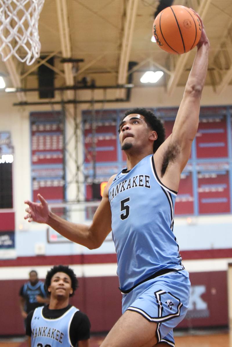 Kankakee's EJ Hazelett elevates for a dunk during a home game against Thornridge Friday, Dec. 5, 2025.