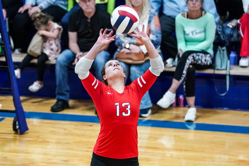 Aurora Christian's Mary Kendall (13) sets the ball during a non-conference match against Newark at Newark High School on Tuesday, Sept. 9, 2025.