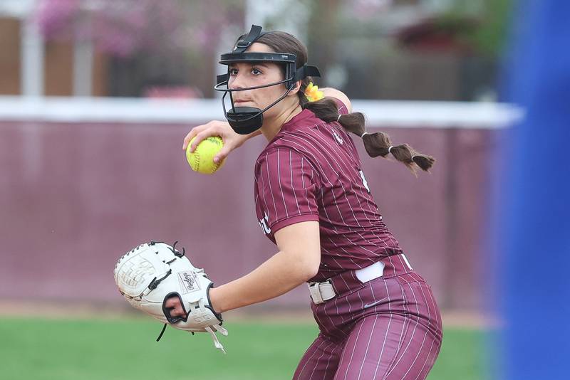 Lockport’s Giovanna Diciolla throws to first for the out against Lincoln-Way East on Monday, April 13, 2026 in Lockport.