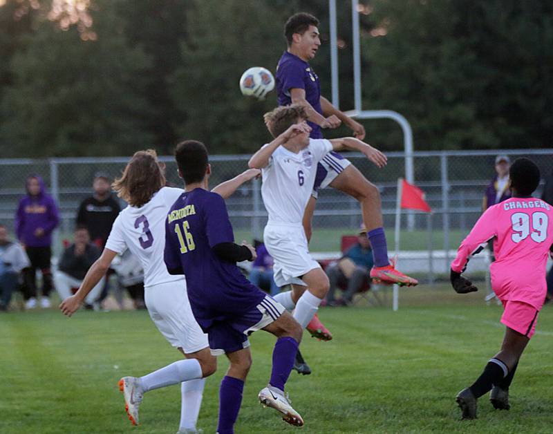 Mendota's Rafael Romero (no,3) knocks the ball away from Peoria Christian's Greyson Below (no,6) and others in the Class 1A Sectional semifinal game in Chillicothe on Tuesday Oct. 19, 2021.