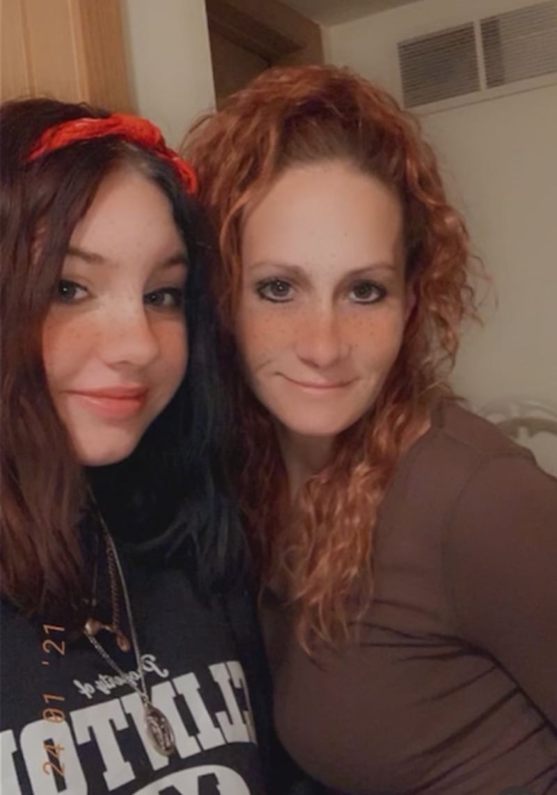 Gracie Sasso-Cleveland (left) and her mother Ericka Sasso (right) pose together in a photo dated Jan. 24, 2021. Gracie Sasso-Cleveland poses outside in this undated photo. Gracie, 15, was found dead in a dumpster May 7, 2023. Timothy M. Doll, 29, of DeKalb, is charged with first-degree murder in her death.