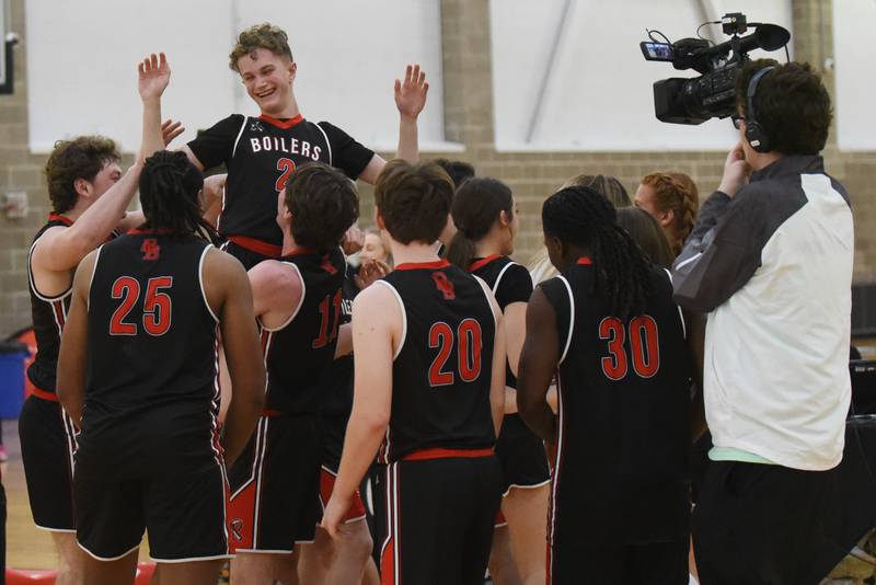 Bradley-Bourbonnais' Nate Corder (2) is hoisted by teammate Mason Shaul as the Boilermakers celebrate their 43-34 win over Mt. Vernon in the IHSA Special Olympics Unified Basketball Division 1 State championship Saturday, March 15, 2025 at the University of Illinois Activities and Recreation Center.