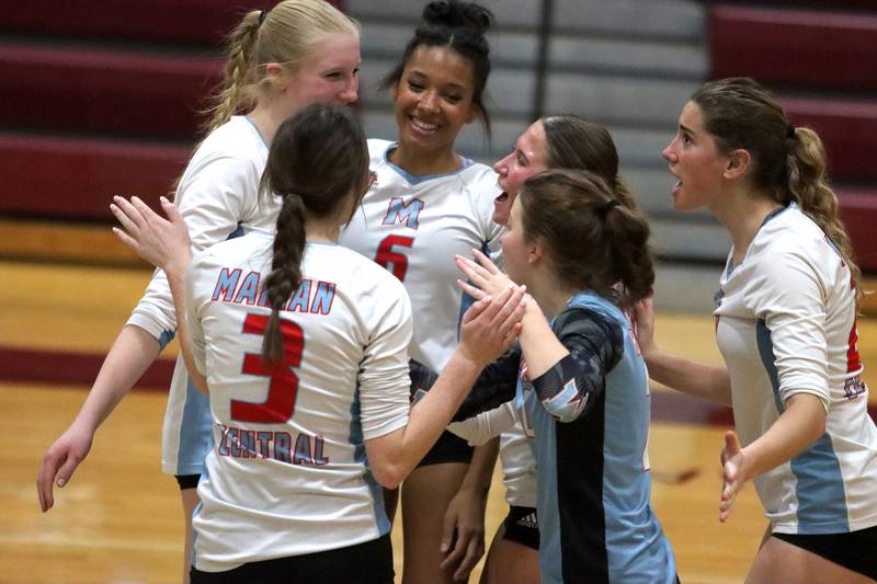 Marian Central’s Hurricanes celebrate a three-set win over Marengo in IHSA Class 2A Regional volleyball action on Monday, Oct. 28, 2024, at  Marengo High School  in Marengo.