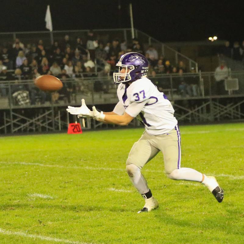 Rochelle's Jonathan Andrist catches a punt during the Hubs' game with Kaneland.