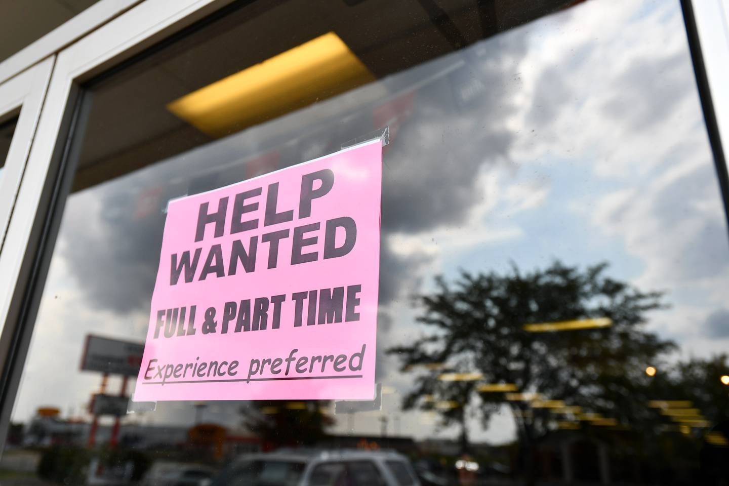 A help wanted sign is displayed in a Bourbonnais business window in Sept. 2021. In April 2025, Kankakee County's unemployment rate dropped to 4.2% below the state's 4.5% average, a good sign of progress according to the Economic Alliance of Kankakee County.