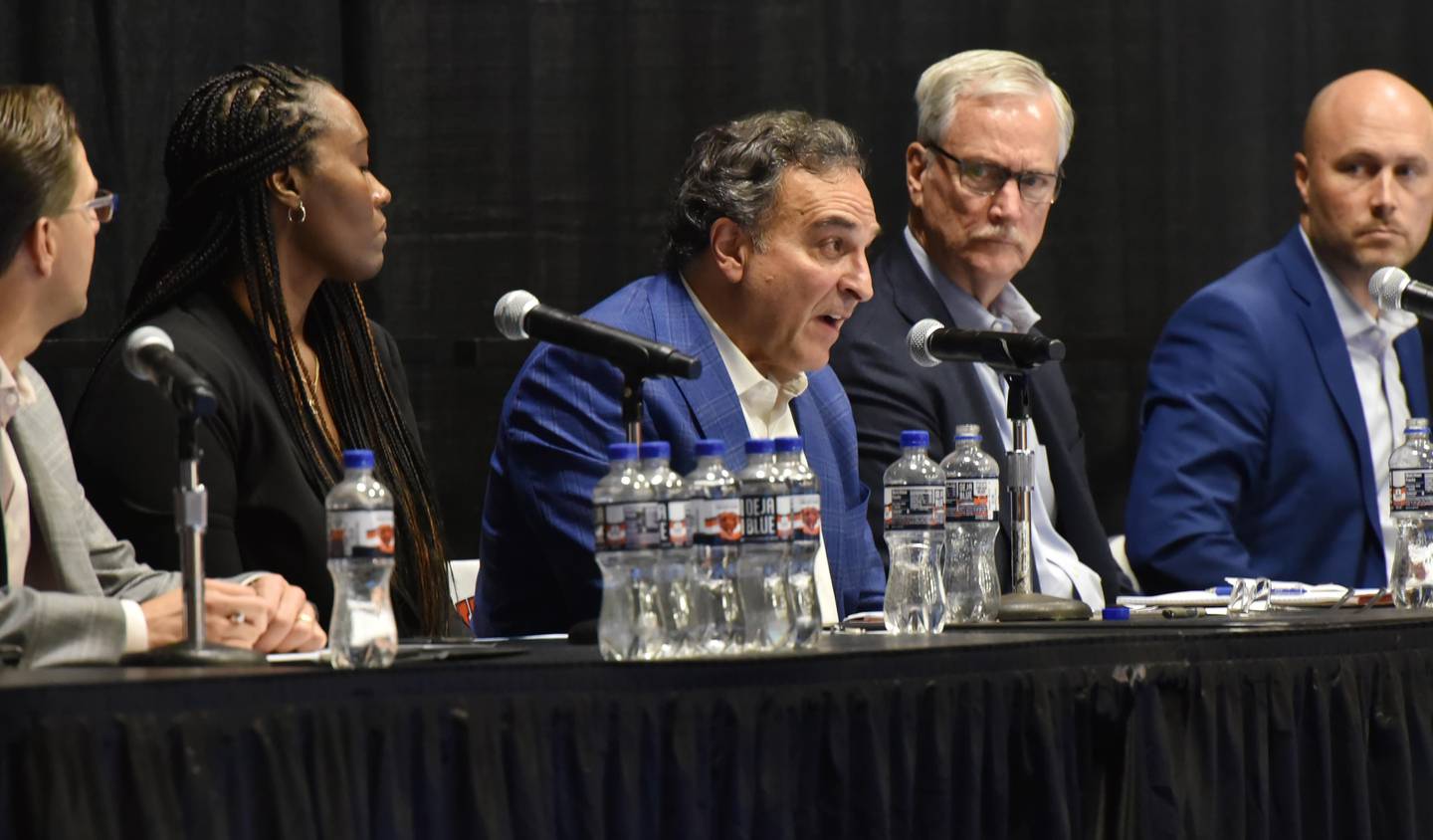 Chicago Bears Chairman George H. McCaskey watches President Ted Phillips speak as officials host a community meeting to discuss their potential move to Arlington Heights on Thursday, September 8, 2022 at Hersey High School in Arlington Heights.