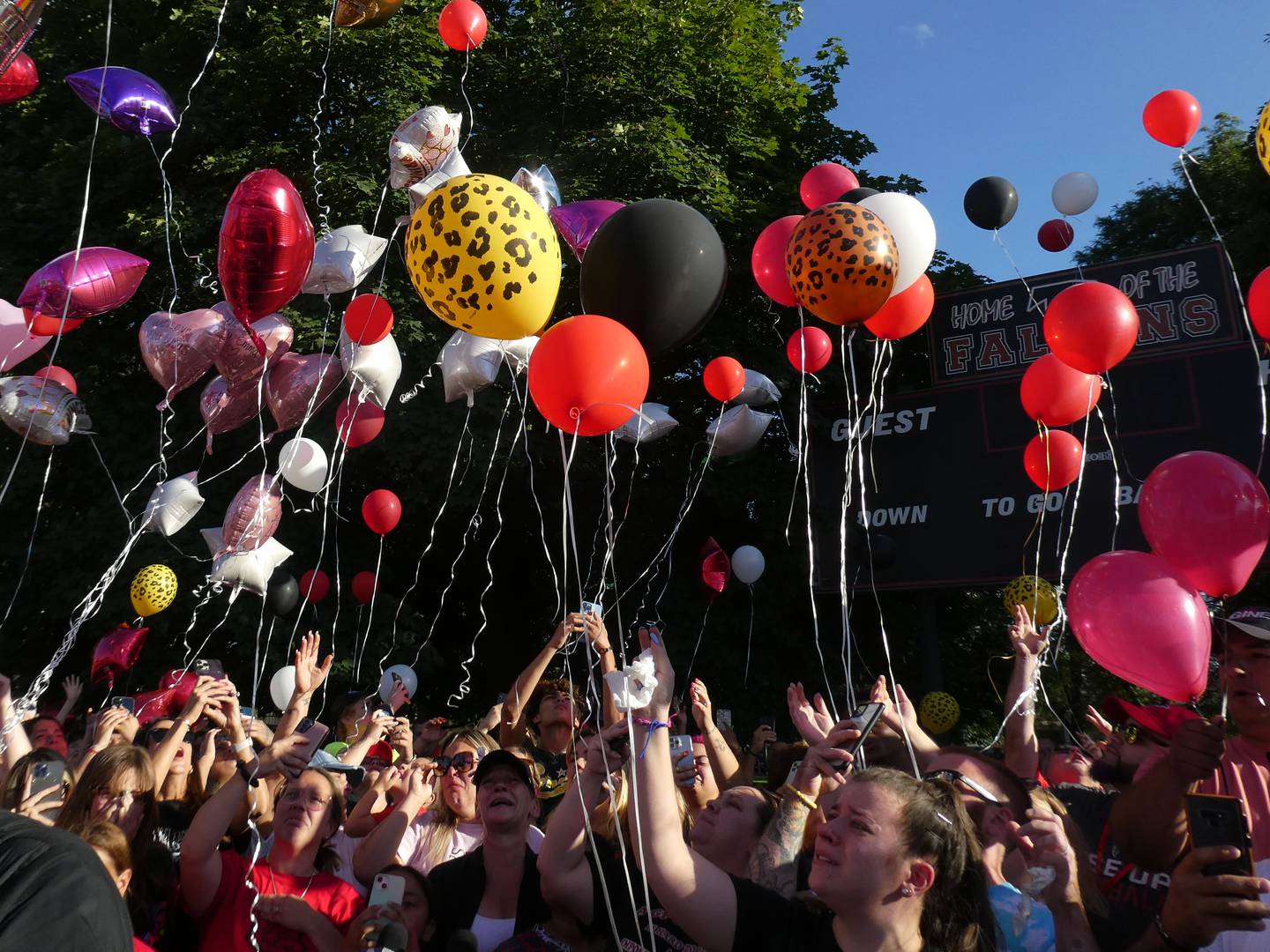 A prayer vigil and balloon release was held at Oriole Park in Chicago on Monday night, August 1, 2022 to mourn the loss of seven killed, including Lauren Dobosz and her four children, in a tragic car crash that occurred Sunday on I-90 near Hampshire.