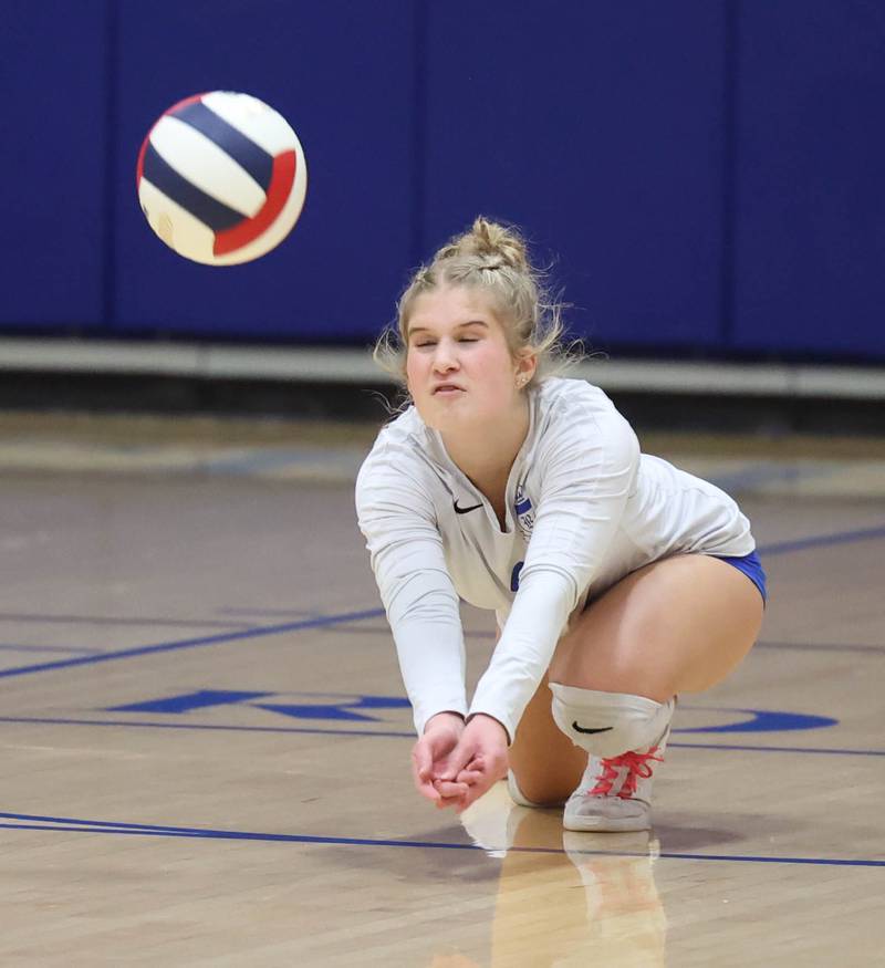 Hinckley-Big Rock's Claire Lambes dives for an Indian Creek serve during their match Tuesday, Sept. 24, 2024, at Hinckley-Big Rock High School.