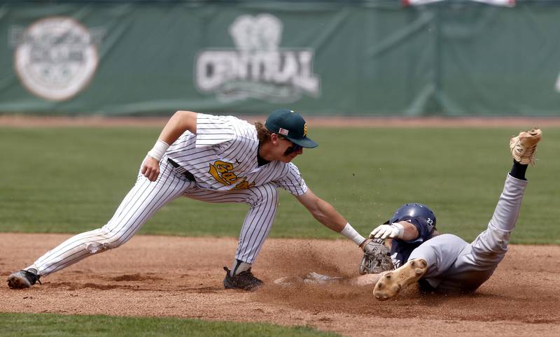 Crystal Lake South's Carson Trivellini tags out Cary-Grove's Peyton Seaburg at second base during the IHSA Class 3A Grayslake Central Sectional Championship baseball game on Saturday, June 7, 2025, at Grayslake Central High School.
